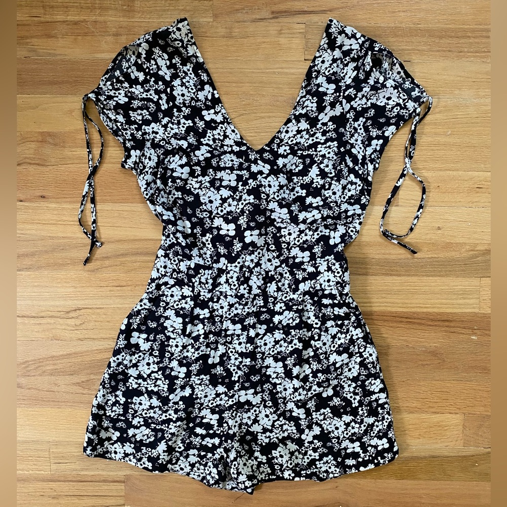 Express women’s black & white floral romper.